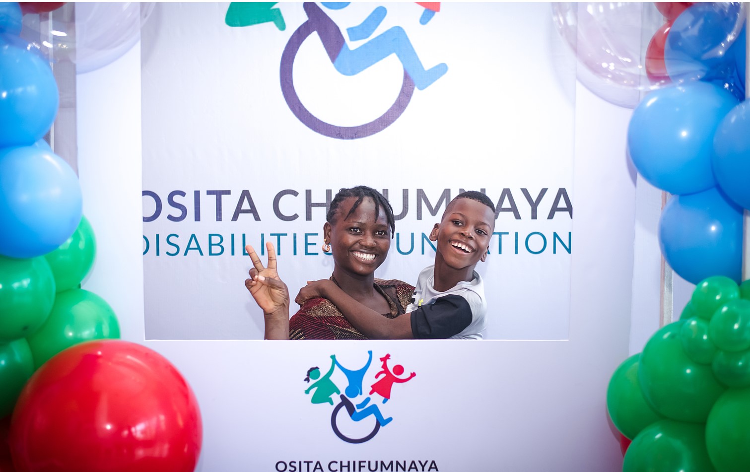 OCDF children and caregivers celebrating together