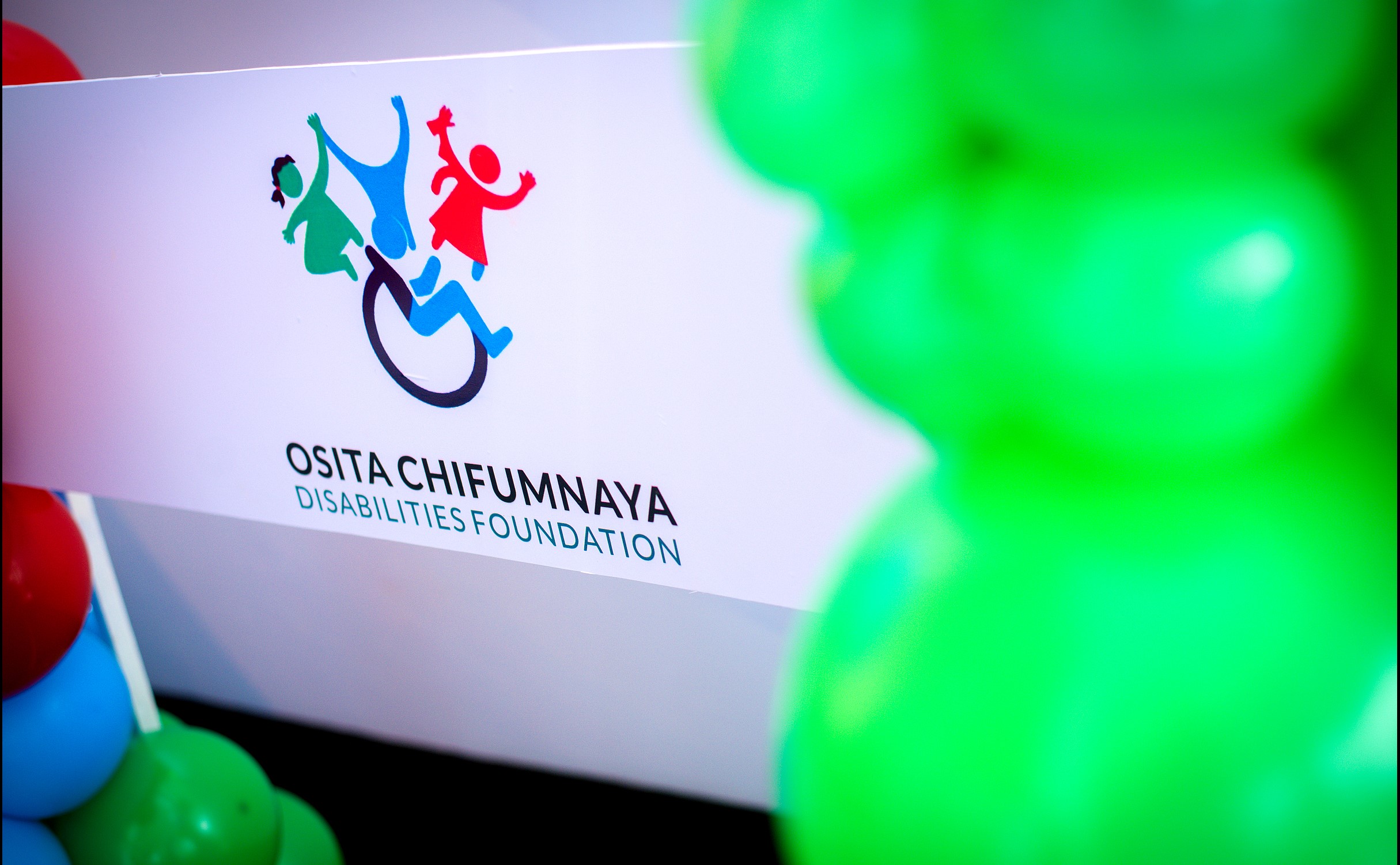 Ms. Okpa M.G.B Aishat, Founder of OCDF, with a child